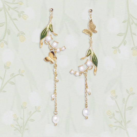 Cherry Blossom Girl Heart Asymmetry Super Fairy Slimming Sweet Earrings $20.00 Dana Fashion Color: Butterfly Winding Flower Women's Accessories Product information: Treatment Process: Electroplating Color: Cherry Blossom, lazy autumn ginkgo cat, four leav