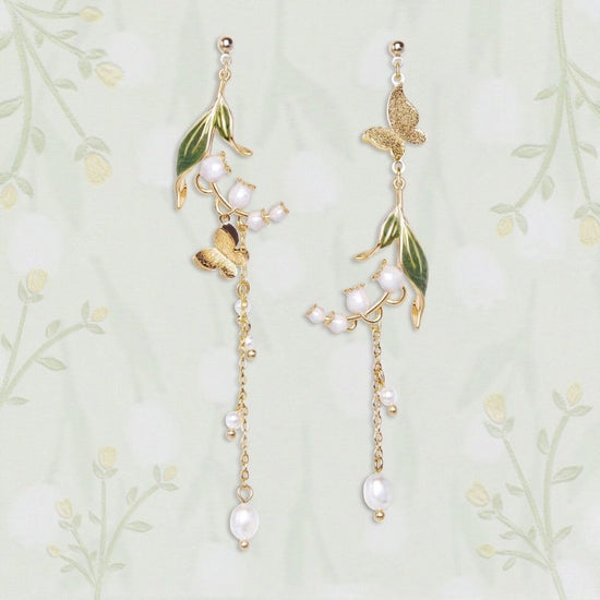 Cherry Blossom Girl Heart Asymmetry Super Fairy Slimming Sweet Earrings $20.00 Dana Fashion Color: Rain Falling Ring Tone Women's Accessories Product information: Treatment Process: Electroplating Color: Cherry Blossom, lazy autumn ginkgo cat, four leaves