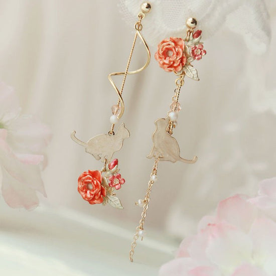 Cherry Blossom Girl Heart Asymmetry Super Fairy Slimming Sweet Earrings $20.00 Dana Fashion Color: Travel Notes Between Flowers Women's Accessories Product information: Treatment Process: Electroplating Color: Cherry Blossom, lazy autumn ginkgo cat, four