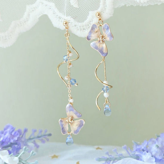 Cherry Blossom Girl Heart Asymmetry Super Fairy Slimming Sweet Earrings $20.00 Dana Fashion Color: Pansy Women's Accessories Product information: Treatment Process: Electroplating Color: Cherry Blossom, lazy autumn ginkgo cat, four leaves spring, Pansy co