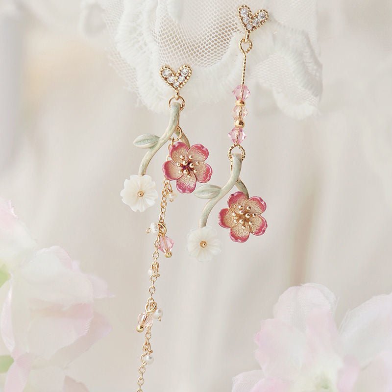 Cherry Blossom Girl Heart Asymmetry Super Fairy Slimming Sweet Earrings $20.00 Dana Fashion Color: Cherry Blossom Women's Accessories Product information: Treatment Process: Electroplating Color: Cherry Blossom, lazy autumn ginkgo cat, four leaves spring,