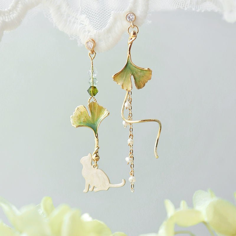 Cherry Blossom Girl Heart Asymmetry Super Fairy Slimming Sweet Earrings $20.00 Dana Fashion Color: Lazy Autumn Ginkgo Cat Women's Accessories Product information: Treatment Process: Electroplating Color: Cherry Blossom, lazy autumn ginkgo cat, four leaves