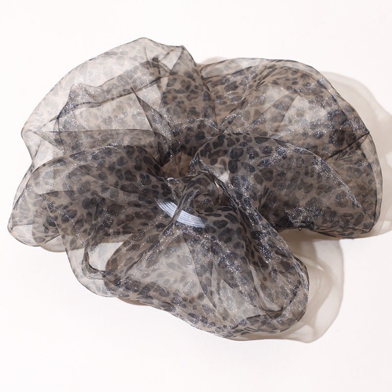 Chiffon Oversized Organza Spring And Summer New Simple Hair Accessories $8.00 Dana Fashion Color: Black Leopard Print Women's Accessories Product information: Processing Technology: Handmade Color: 1# Orange large intestine hair ring, 2# purple large inte