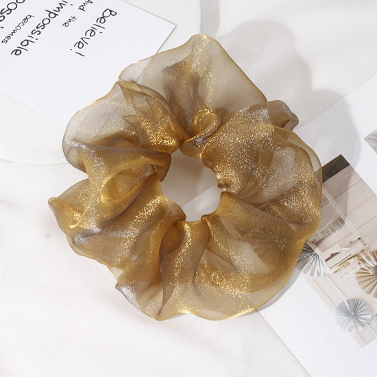 Chiffon Oversized Organza Spring And Summer New Simple Hair Accessories $8.00 Dana Fashion Color: Gold Women's Accessories Product information: Processing Technology: Handmade Color: 1# Orange large intestine hair ring, 2# purple large intestine hair ring