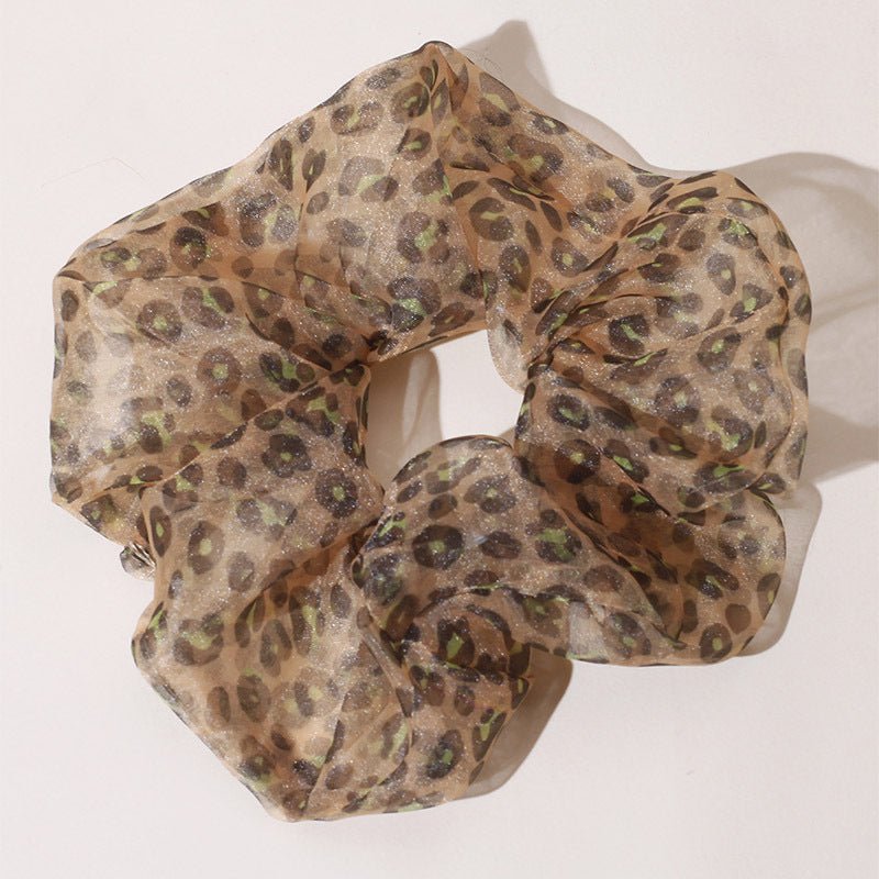 Chiffon Oversized Organza Spring And Summer New Simple Hair Accessories $8.00 Dana Fashion Color: Brown Leopard Print Women's Accessories Product information: Processing Technology: Handmade Color: 1# Orange large intestine hair ring, 2# purple large inte