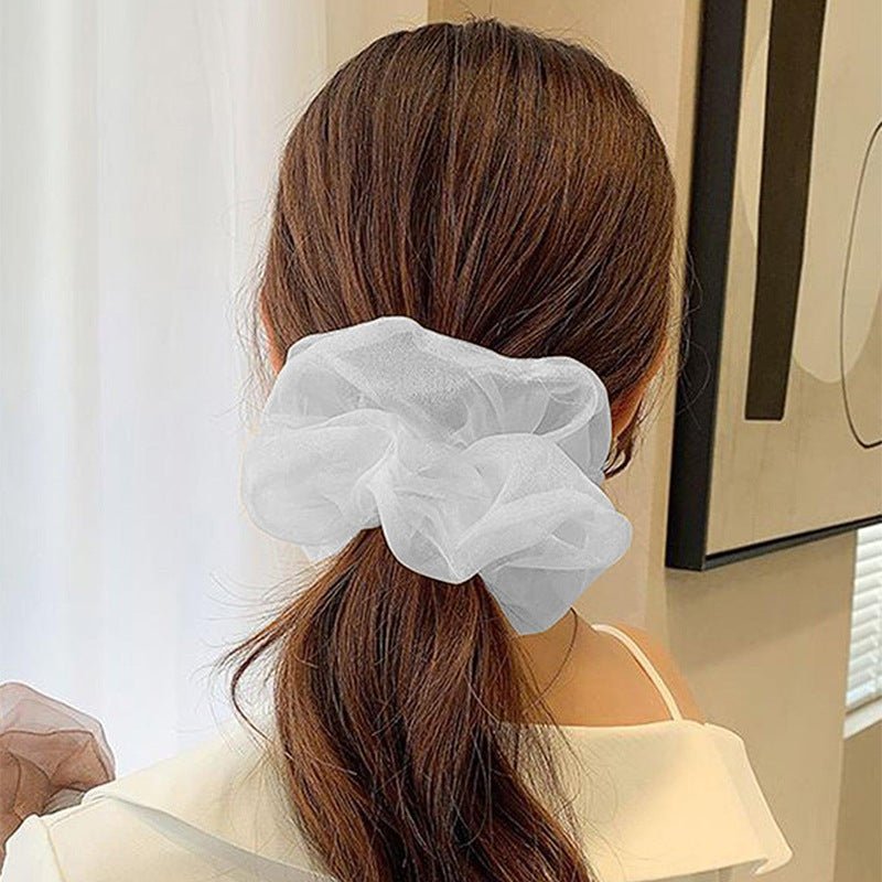 Chiffon Oversized Organza Spring And Summer New Simple Hair Accessories $8.00 Dana Fashion Color: White Women's Accessories Product information: Processing Technology: Handmade Color: 1# Orange large intestine hair ring, 2# purple large intestine hair rin