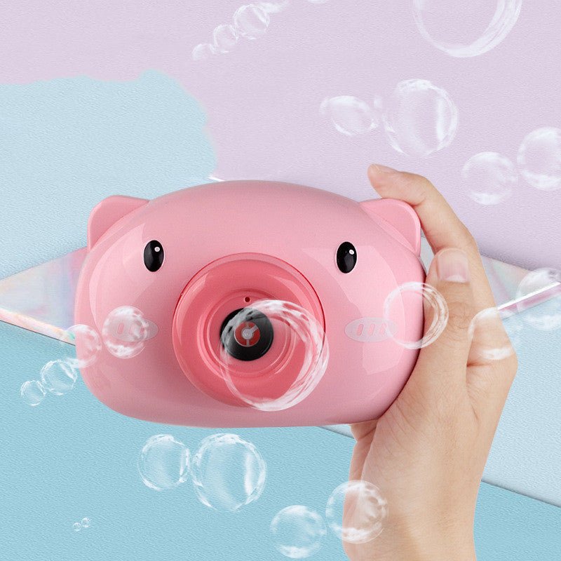 child Bubble machine camera $26.95 Dana Fashion Color: Bubble Pig Baby & Mother Material: Plastic/Plastic Packing method: color box, pp bag Ability training: vision, hand-eye coordination, interactive toys, parent-child communication Is there an animation