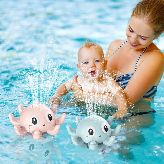 Children's Automatic Water Spray Bath Toys Bath Fun Toys With Flashing Water Spray Toy Baby Swimming Shower With Toys New $20.77 Dana Fashion Color: Blue Toys & Hobbies Overview: [Happy bathing time for the baby] When the luminous bath toy is placed in th