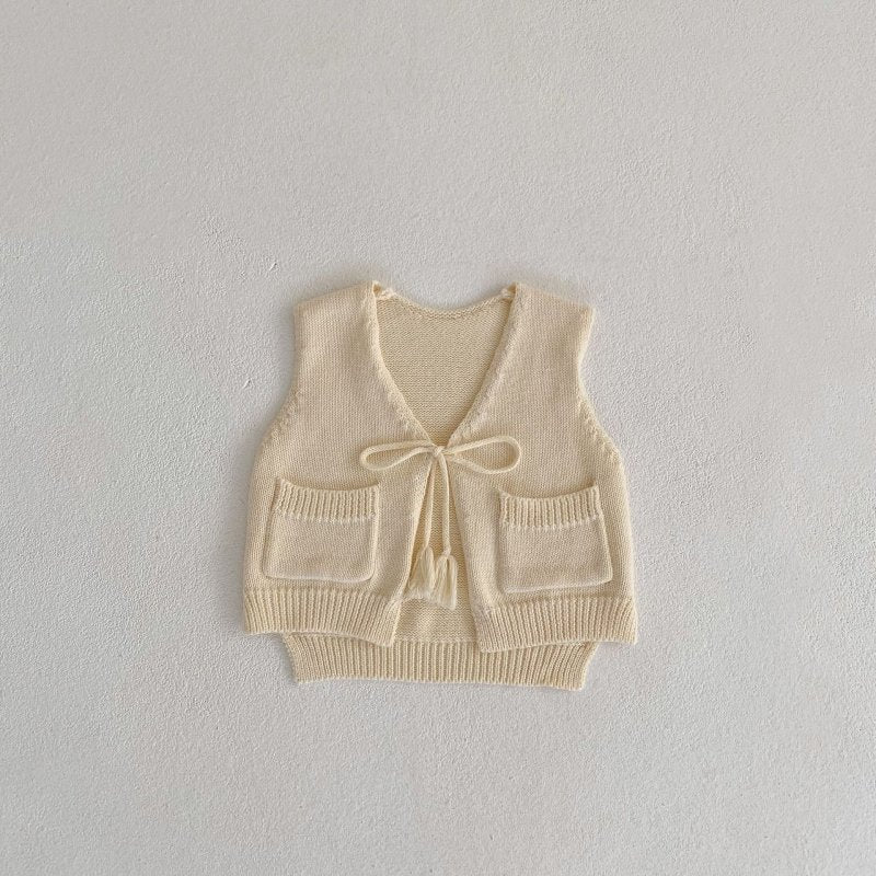 Children's Cardigan Knitted Tassel Tie Vest $30.55 Dana Fashion Color: Apricot White Child size: 100cm Baby Clothing Product information: Fabric name: Cotton Main fabric composition: cotton Main fabric component content: 100% Collar type: V-shaped collar