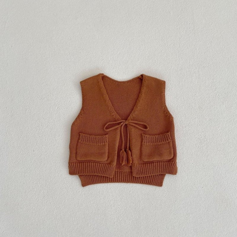 Children's Cardigan Knitted Tassel Tie Vest $30.55 Dana Fashion Color: Stone yellow Child size: 100cm Baby Clothing Product information: Fabric name: Cotton Main fabric composition: cotton Main fabric component content: 100% Collar type: V-shaped collar C