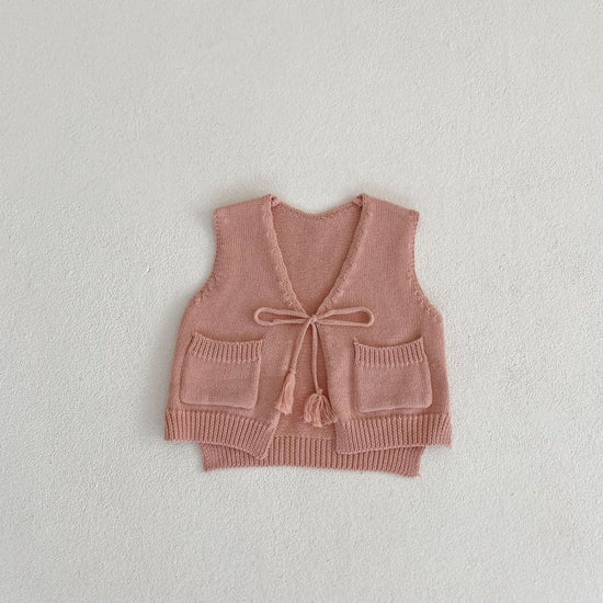 Children's Cardigan Knitted Tassel Tie Vest $30.55 Dana Fashion Color: Pink Child size: 100cm Baby Clothing Product information: Fabric name: Cotton Main fabric composition: cotton Main fabric component content: 100% Collar type: V-shaped collar Color: pi