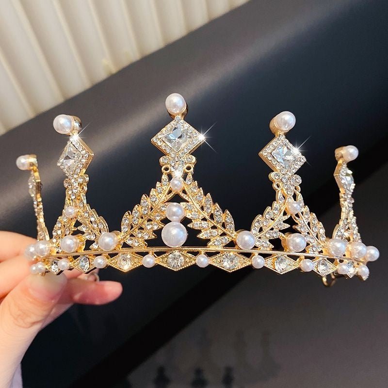 Children's Children's Crown Headdress Girls Princess Crown Hair Clip $23.50 Dana Fashion Color: 10Golden Pearl Women's Accessories Product information: Pattern: Cross/Crown/Roman numerals Treatment Process: Electroplating Type: Hair accessories suit Color