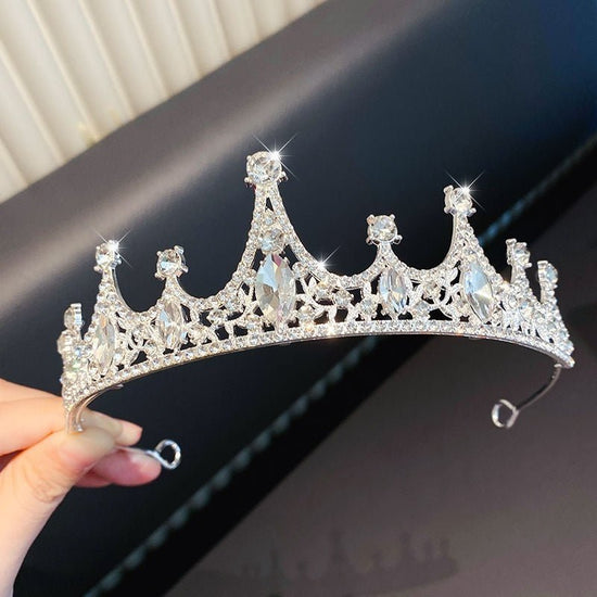 Children's Children's Crown Headdress Girls Princess Crown Hair Clip $23.50 Dana Fashion Color: 5Rhinestone Crown Women's Accessories Product information: Pattern: Cross/Crown/Roman numerals Treatment Process: Electroplating Type: Hair accessories suit Co