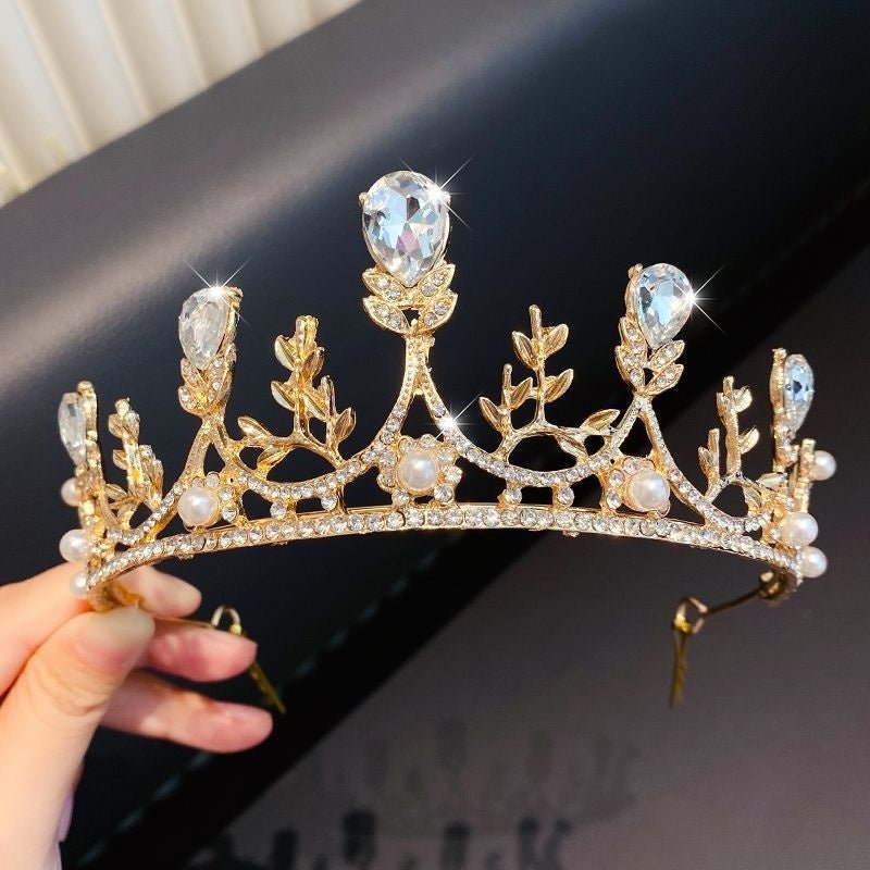 Children's Children's Crown Headdress Girls Princess Crown Hair Clip $23.50 Dana Fashion Color: 11Golden Diamond Leaf Crown Women's Accessories Product information: Pattern: Cross/Crown/Roman numerals Treatment Process: Electroplating Type: Hair accessori