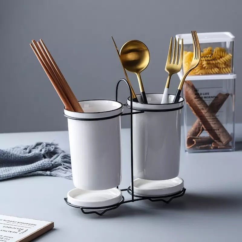 Chopsticks, knife, fork and spoon storage rack $26.36 Dana Fashion Color: White Dana's Kitchen Material: Ceramic Product advantages: 1. Smaller, more application scenarios 2. No need to wait for the plate to dry before storage 3. Automatically drain exces