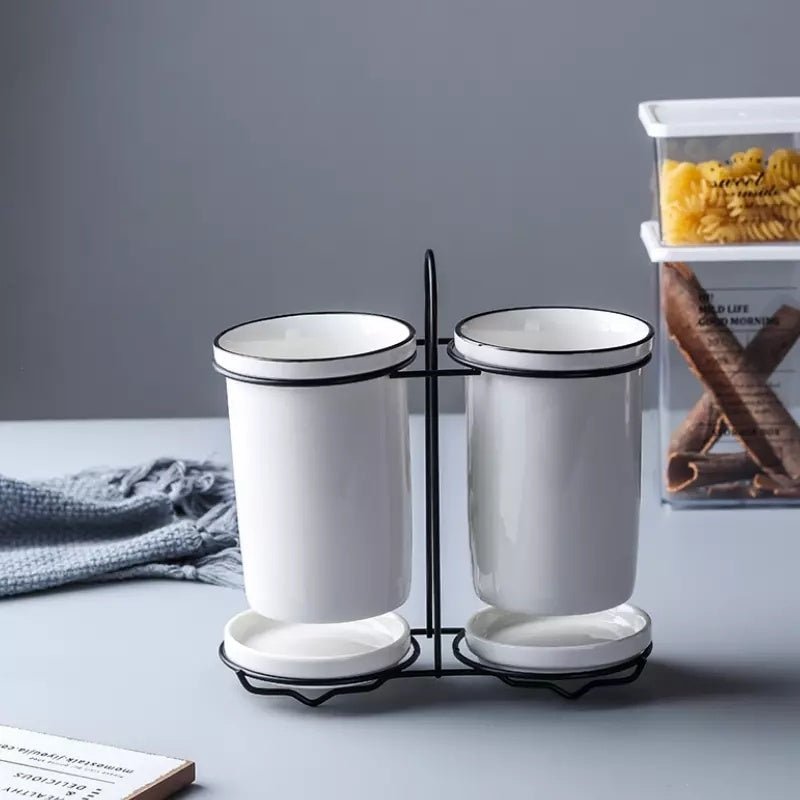 Chopsticks, knife, fork and spoon storage rack $26.36 Dana Fashion Color: White Dana's Kitchen Material: Ceramic Product advantages: 1. Smaller, more application scenarios 2. No need to wait for the plate to dry before storage 3. Automatically drain exces