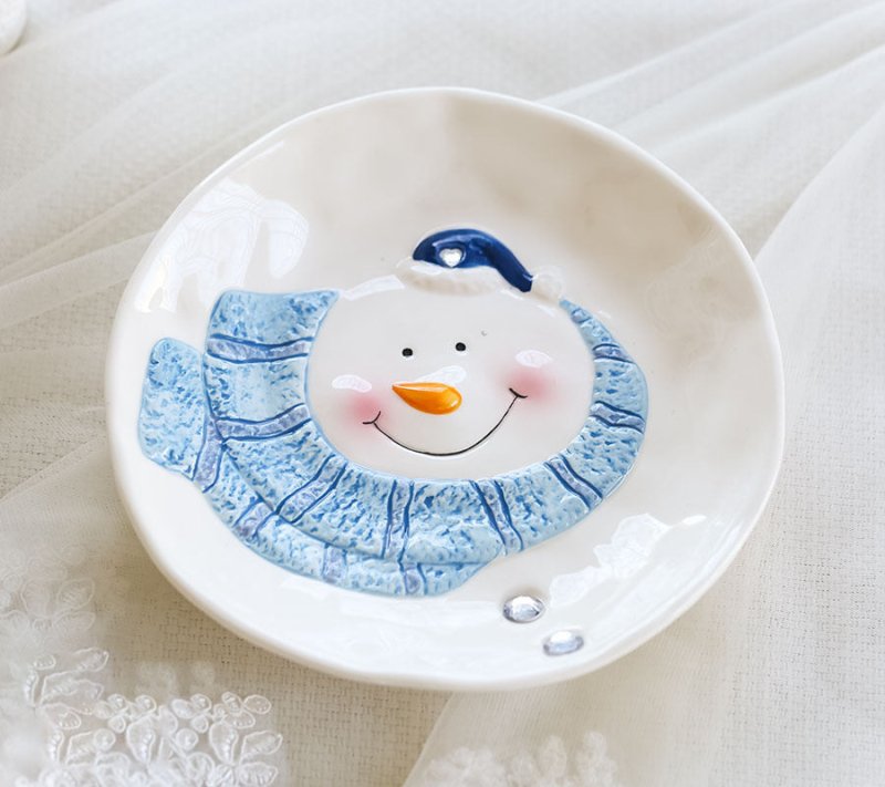 Christmas Ceramic Ornaments and Snowman Tableware $48.30 Dana Fashion Color: Plate Dana's Kitchen Overview: 100% new design and high quality Set off the festive mood Feel comfortable Cute modeling Note： Rhinestones will fall when heated Specification： Mat