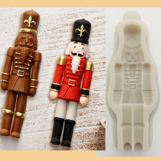 Christmas Guard Fondant Cake Chocolate Mould $10.44 Dana Fashion format: Light grey Dana's Kitchen Overview: 1.100% food-grade silicone 2.Odorless, non-toxic, dust-proof, durable, non-permeable, easy to clean. 3.flexible, reusable, non-sticky, easy to rel