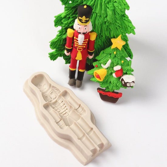 Christmas Guard Fondant Cake Chocolate Mould $10.44 Dana Fashion format: Light grey Dana's Kitchen Overview: 1.100% food-grade silicone 2.Odorless, non-toxic, dust-proof, durable, non-permeable, easy to clean. 3.flexible, reusable, non-sticky, easy to rel