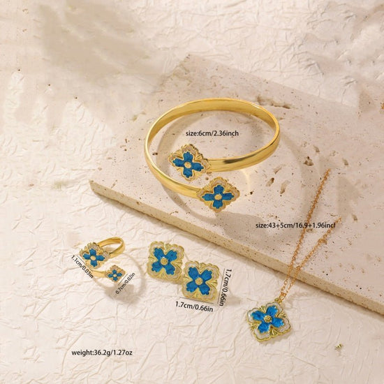 Clover Bracelet Earring Set $20.50 Dana Fashion Color: Black Women's Accessories Product attributes Type: Jewelry Set Material: Alloy Inlay material: Drip oil Brand: Jiutong Shape: Flower Processing technology: Electroplating Origin: Yiwu Style: Women's M