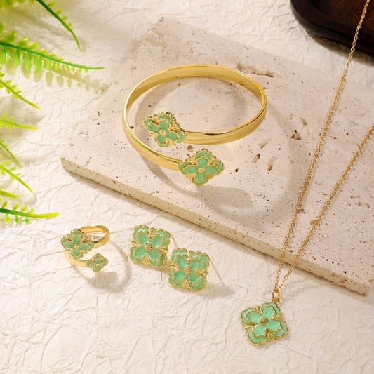 Clover Bracelet Earring Set $20.50 Dana Fashion Color: Black Women's Accessories Product attributes Type: Jewelry Set Material: Alloy Inlay material: Drip oil Brand: Jiutong Shape: Flower Processing technology: Electroplating Origin: Yiwu Style: Women's M