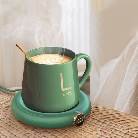 Coffee Mug Warmer Warm Coaster Smart Heating Cup Thermal Insulation Constant Temperature Coaster Heating Pad Desktop $40.00 Dana Fashion Color: M306 green Electrical outlet: USB Dana's Kitchen Overview: - Keep your coffee warm all morning long with this s
