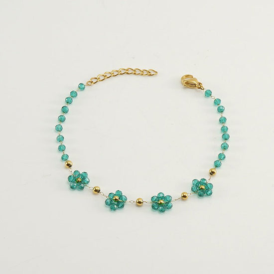 Color Crystal Flowers Stainless Steel Bracelet $17.50 Dana Fashion Color: Green Bracelet Women's Accessories Product information: Treatment Process: Electroplating Color: Black bracelet, dark red bracelet, blue bracelet, bronze bracelet, green bracelet, b