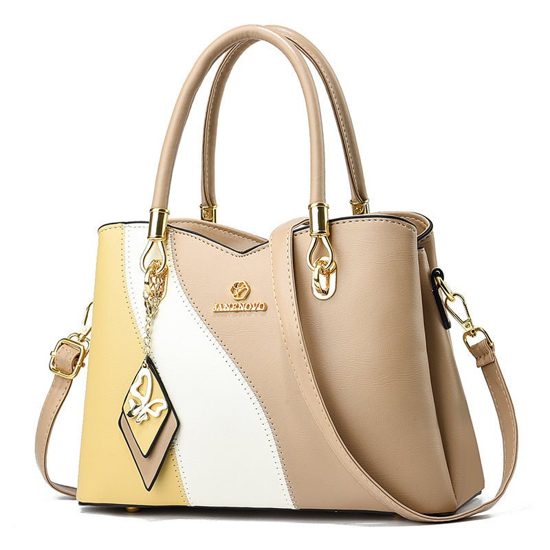 Contrast Color Handbag Large Capacity Soft Leather $54.10 Dana Fashion Color: Khaki Women's Bags Product information: Lining texture: PU Color: black, white, white stitching pink, green, pink, white and yellow, khaki, wine red Outer bag type: slit pocket