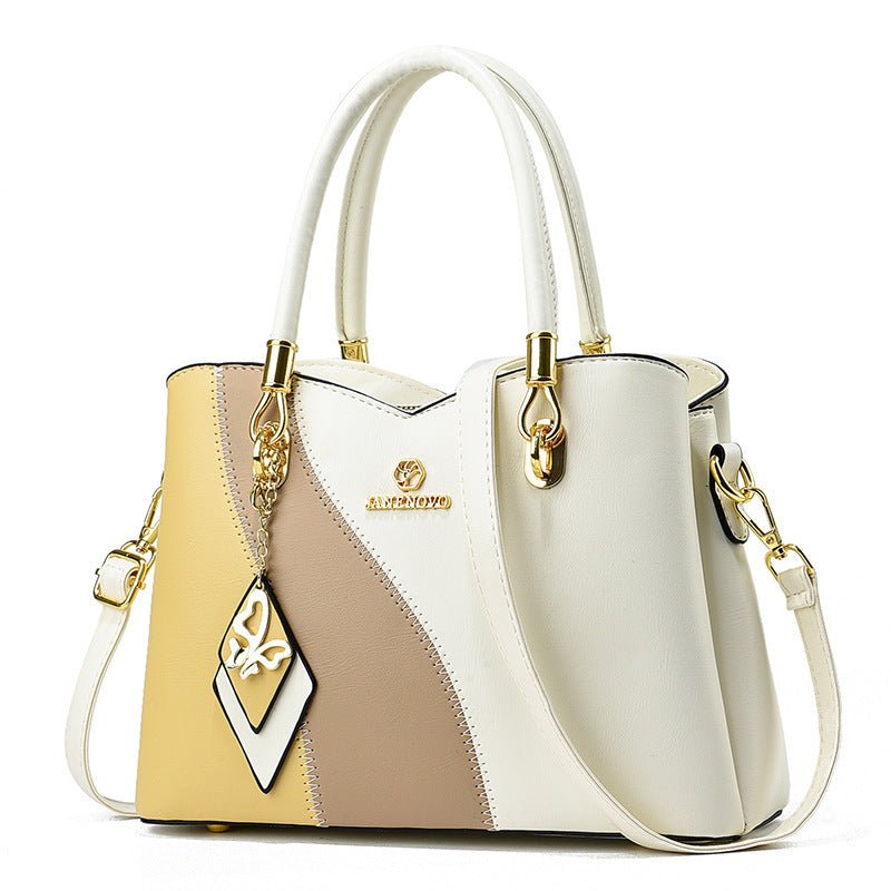 Contrast Color Handbag Large Capacity Soft Leather $54.10 Dana Fashion Color: White And Yellow Women's Bags Product information: Lining texture: PU Color: black, white, white stitching pink, green, pink, white and yellow, khaki, wine red Outer bag type: s