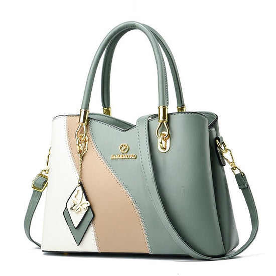 Contrast Color Handbag Large Capacity Soft Leather $54.10 Dana Fashion Color: Green Women's Bags Product information: Lining texture: PU Color: black, white, white stitching pink, green, pink, white and yellow, khaki, wine red Outer bag type: slit pocket