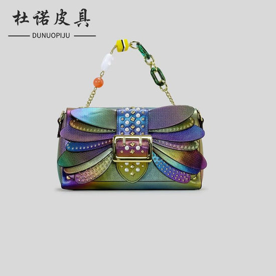 Contrast Color Heavy Industry Manual Rivet Butterfly Wings Handbag $99.00 Dana Fashion Color: Purple Women's Bags Product information: Applicable scenario: leisure travel Color: pink, purple Outer bag type: open pocket Hardness: medium hard Material: PU S