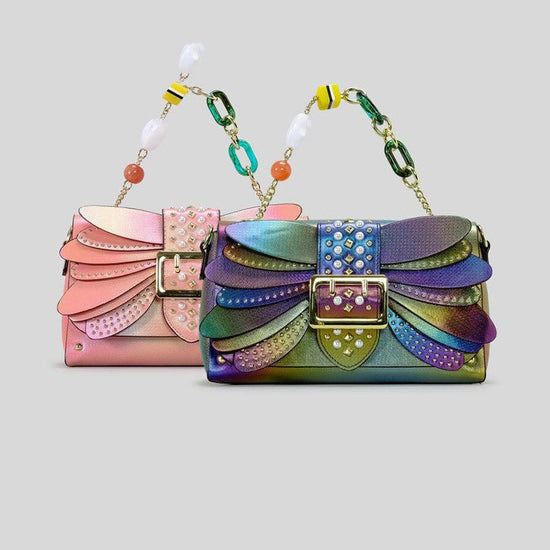 Contrast Color Heavy Industry Manual Rivet Butterfly Wings Handbag $99.00 Dana Fashion Color: Pink Women's Bags Product information: Applicable scenario: leisure travel Color: pink, purple Outer bag type: open pocket Hardness: medium hard Material: PU Sui