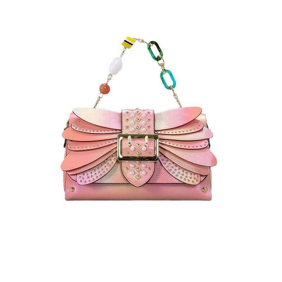 Contrast Color Heavy Industry Manual Rivet Butterfly Wings Handbag $99.00 Dana Fashion Color: Pink Women's Bags Product information: Applicable scenario: leisure travel Color: pink, purple Outer bag type: open pocket Hardness: medium hard Material: PU Sui