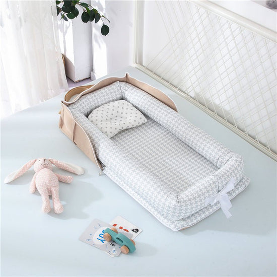 Cotton Portable Baby Crib Newborn Foldable $107.86 Dana Fashion Color: Houndstooth grey Baby & Mother Overview： Anti-pressure crib, professionally care for your baby Protective isolation, comfortable sleep Adjustable crossbody shoulder strap Give babies a