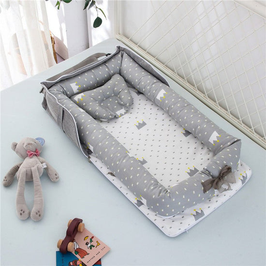 Cotton Portable Baby Crib Newborn Foldable $110.33 Dana Fashion Color: Crown grey Baby & Mother Overview： Anti-pressure crib, professionally care for your baby Protective isolation, comfortable sleep Adjustable crossbody shoulder strap Give babies a sense