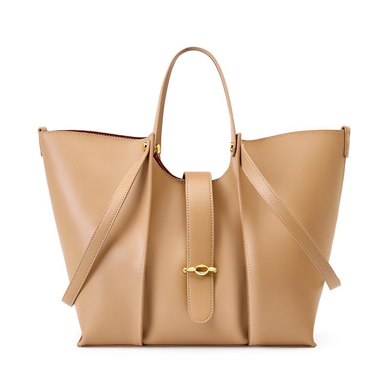 Cowhide Large Capacity Totes High-grade Women's Bag $139.00 Dana Fashion Color: Apricot Women's Bags Product information: Lining texture: Polyester Applicable scenarios: Daily matching Color: Brown, apricot Outer bag type: Sandwich pocket Leather characte