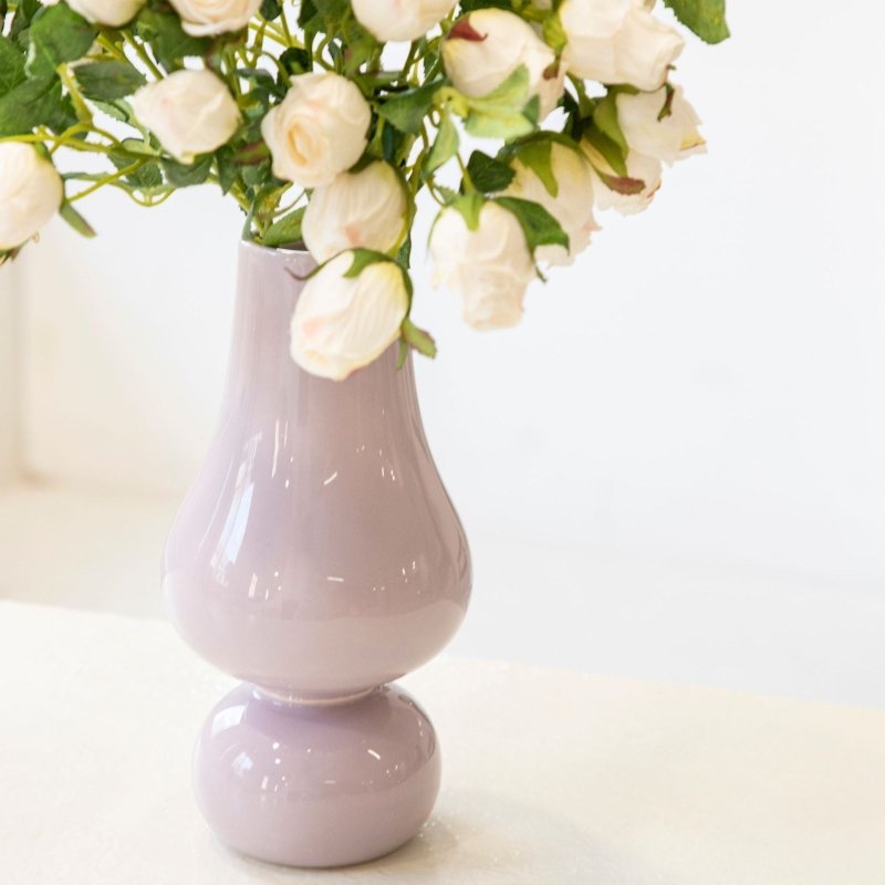 Creative Ceramic Vase Home Living Room $34.31 Dana Fashion Color: Purple1 Dana's Kitchen Product Details: Material: Ceramic Surface technology: spray painting Process: color glaze Color: Purple 1, Purple 2 Size information: Package Contents: Vase X1
