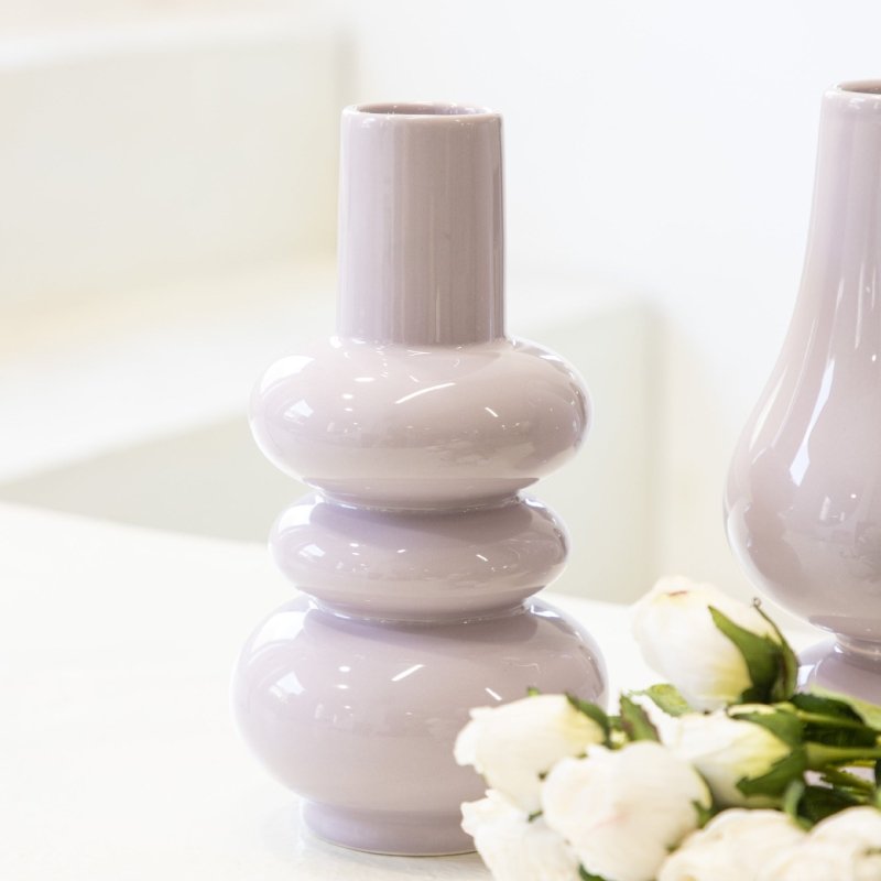 Creative Ceramic Vase Home Living Room $34.31 Dana Fashion Color: Purple1 Dana's Kitchen Product Details: Material: Ceramic Surface technology: spray painting Process: color glaze Color: Purple 1, Purple 2 Size information: Package Contents: Vase X1