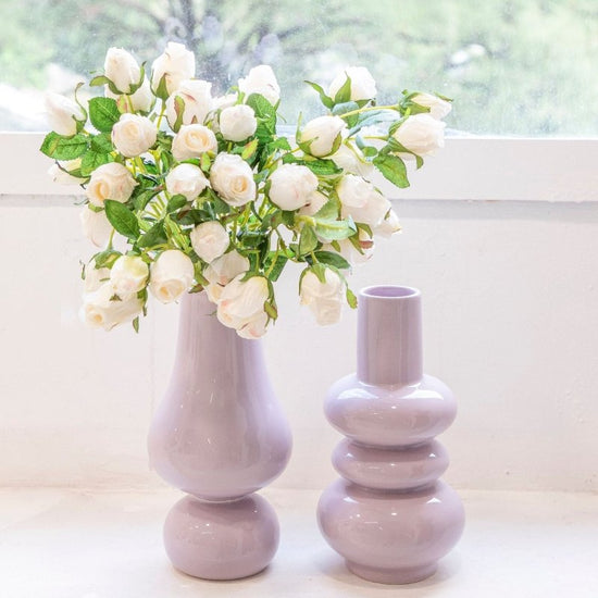 Creative Ceramic Vase Home Living Room $34.31 Dana Fashion Color: Purple1 Dana's Kitchen Product Details: Material: Ceramic Surface technology: spray painting Process: color glaze Color: Purple 1, Purple 2 Size information: Package Contents: Vase X1