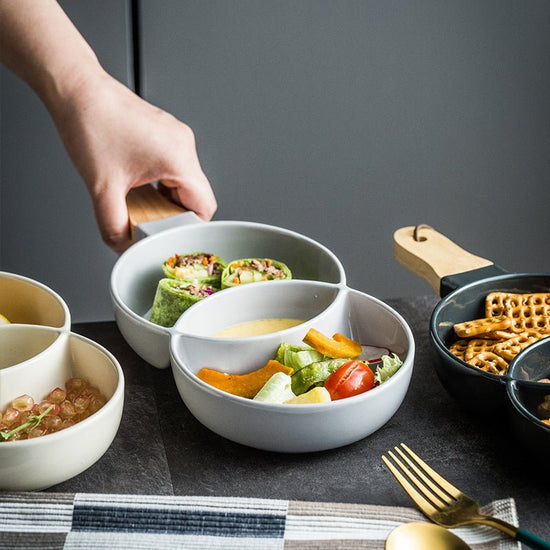 Creative cutlery tray for household tableware $35.50 Dana Fashion Color: Cream color Dana's Kitchen Material: Porcelain Applicable objects: adult plate Type: Soup plate tea tableware Process: color glaze