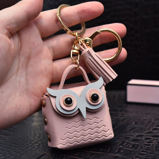 Creative Leather Owl Coin Purse Keychain $10.14 Dana Fashion Color: Pink Women's Bags Product information: Color: red, pink, yellow, beige, blue, gray blue, sapphire blue, black Material: Leather Product size: as shown below Product use: key chain pendant