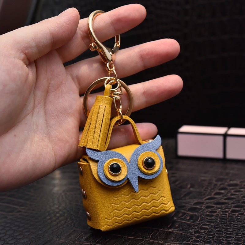Creative Leather Owl Coin Purse Keychain $10.14 Dana Fashion Color: Yellow Women's Bags Product information: Color: red, pink, yellow, beige, blue, gray blue, sapphire blue, black Material: Leather Product size: as shown below Product use: key chain penda