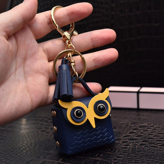 Creative Leather Owl Coin Purse Keychain $10.14 Dana Fashion Color: Sapphire Blue Women's Bags Product information: Color: red, pink, yellow, beige, blue, gray blue, sapphire blue, black Material: Leather Product size: as shown below Product use: key chai