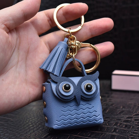 Creative Leather Owl Coin Purse Keychain $10.14 Dana Fashion Color: Blue Women's Bags Product information: Color: red, pink, yellow, beige, blue, gray blue, sapphire blue, black Material: Leather Product size: as shown below Product use: key chain pendant