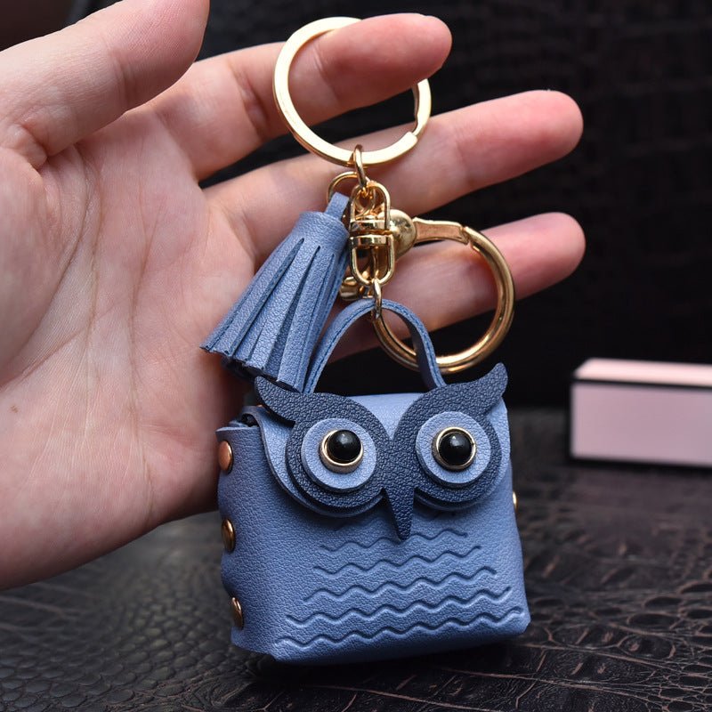 Creative Leather Owl Coin Purse Keychain $10.14 Dana Fashion Color: Blue Women's Bags Product information: Color: red, pink, yellow, beige, blue, gray blue, sapphire blue, black Material: Leather Product size: as shown below Product use: key chain pendant