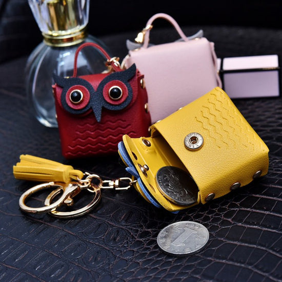 Creative Leather Owl Coin Purse Keychain $10.14 Dana Fashion Color: Beige Women's Bags Product information: Color: red, pink, yellow, beige, blue, gray blue, sapphire blue, black Material: Leather Product size: as shown below Product use: key chain pendan