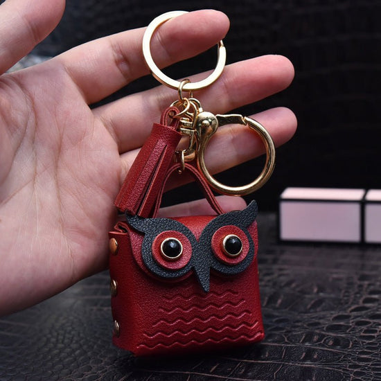 Creative Leather Owl Coin Purse Keychain $10.14 Dana Fashion Color: Red Women's Bags Product information: Color: red, pink, yellow, beige, blue, gray blue, sapphire blue, black Material: Leather Product size: as shown below Product use: key chain pendant
