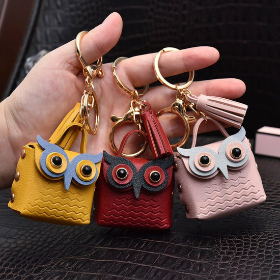 Creative Leather Owl Coin Purse Keychain $10.14 Dana Fashion Color: Beige Women's Bags Product information: Color: red, pink, yellow, beige, blue, gray blue, sapphire blue, black Material: Leather Product size: as shown below Product use: key chain pendan