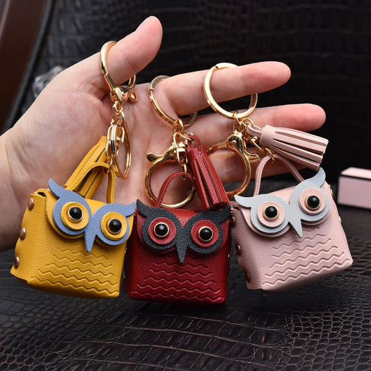 Creative Leather Owl Coin Purse Keychain $10.14 Dana Fashion Color: Beige Women's Bags Product information: Color: red, pink, yellow, beige, blue, gray blue, sapphire blue, black Material: Leather Product size: as shown below Product use: key chain pendan