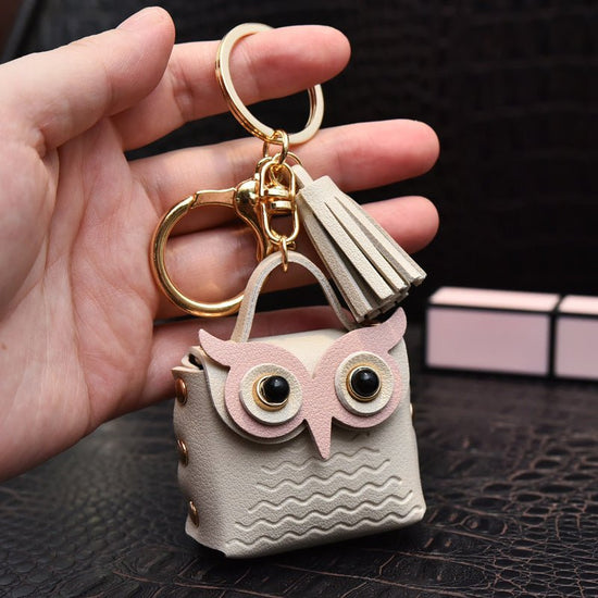 Creative Leather Owl Coin Purse Keychain $10.14 Dana Fashion Color: Beige Women's Bags Product information: Color: red, pink, yellow, beige, blue, gray blue, sapphire blue, black Material: Leather Product size: as shown below Product use: key chain pendan